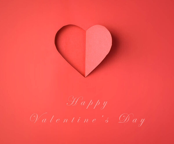 Happy Valentines day, Red Heart from paper. Good Holiday Card, romantic gift design.                   