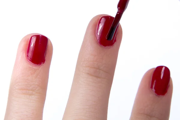 Amateur red nail polish — Stock Photo, Image