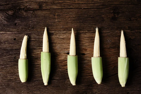 Corn on wooden background — Stock Photo, Image