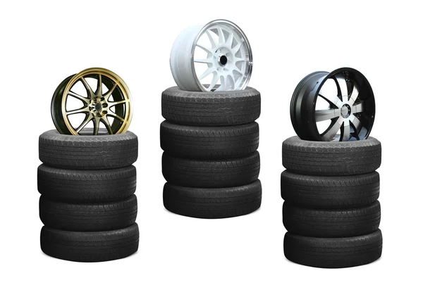 Cerchi in lega auto su pneumatici isolati su sfondo bianco — Foto Stock