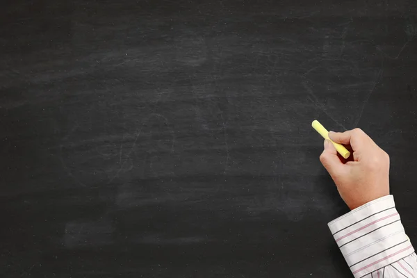 Hand writing on blackboard — Stock Photo, Image