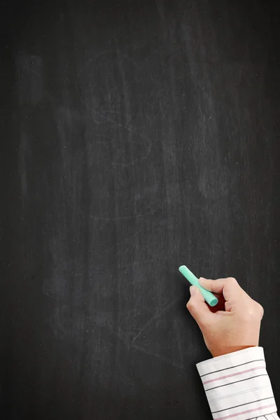 Hand writing on blackboard — Stock Photo, Image