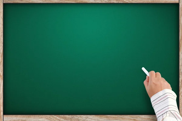 Hand writing on blackboard — Stock Photo, Image