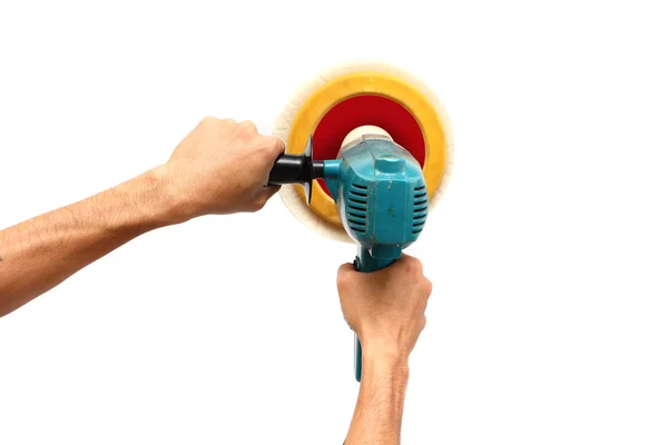 Man holds the Machine polisher for car care — Stock Photo, Image