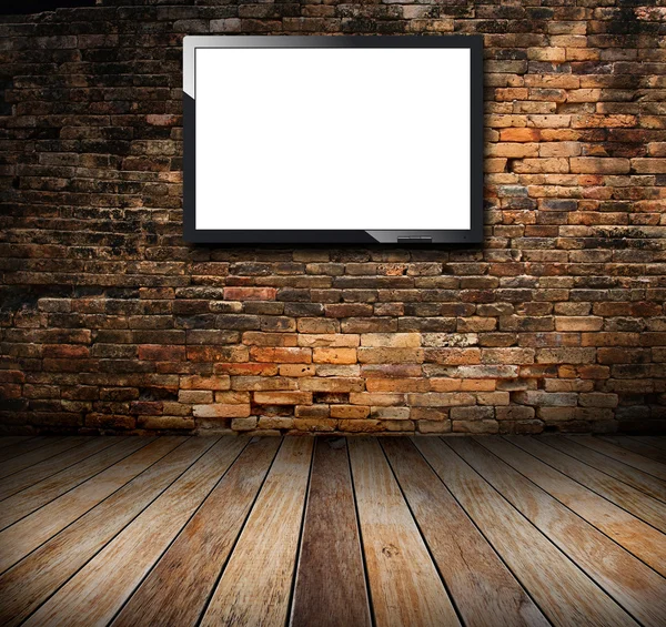 TV na sala de parede de tijolos — Fotografia de Stock