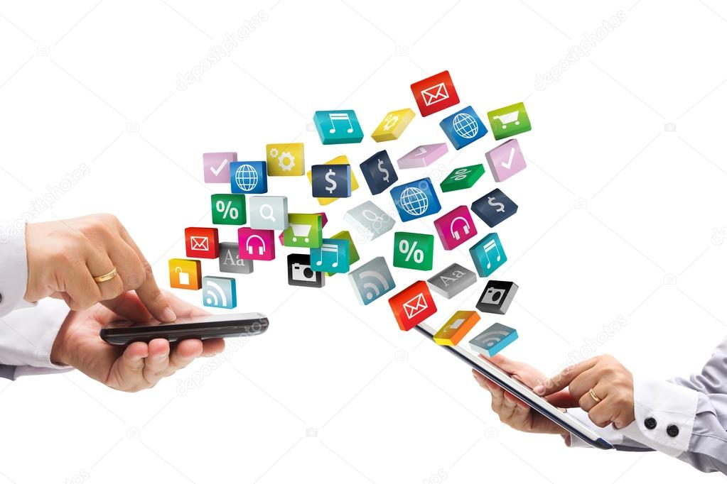 Hands holding the phone and tablet  pc with colorful application icons