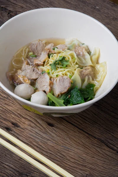 Noodles bowl on wooden background — Stock Photo, Image