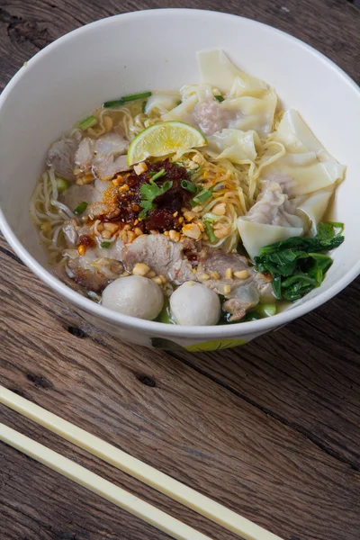 Noodles bowl on wooden background — Stock Photo, Image