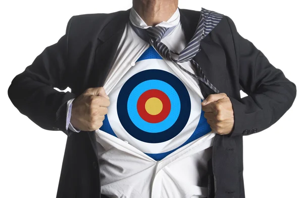 Businessman showing a target under his shirt — Stock Photo, Image