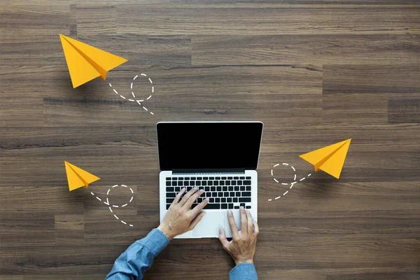 Top View Businessman Working Laptop Computer Flying Yellow Paper Airplanes — Stock fotografie