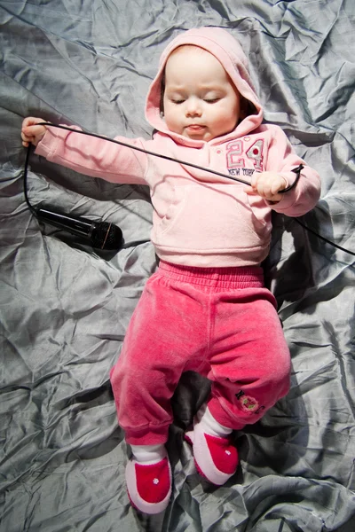 Baby with microphone — Stock Photo, Image