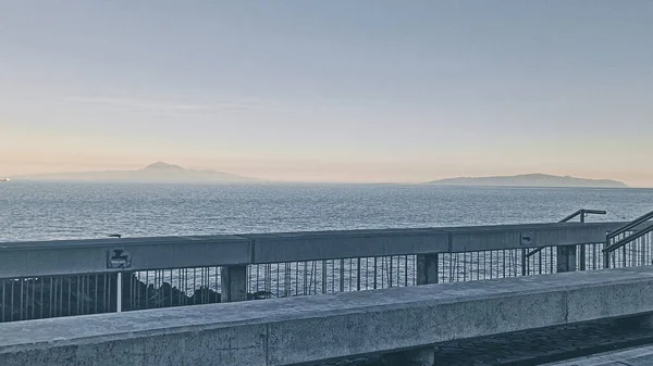 views of the island of tenerife and la gomera from the sea surrounded by calima