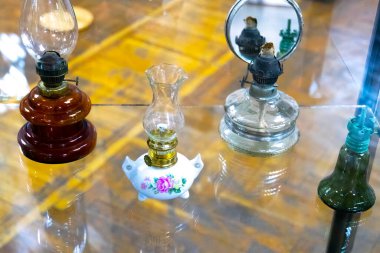 Vintage kerosene lamp on the table