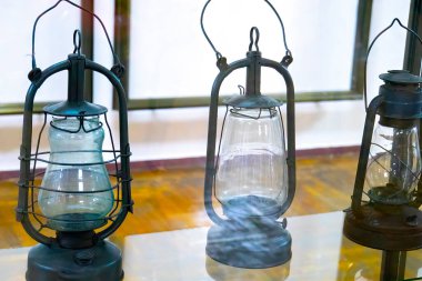 Vintage kerosene lamp on the table