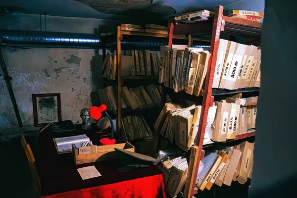 Folder storage room details in metal shelves wooden brown cases with police evidence