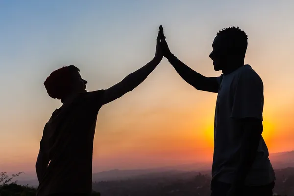 Friends High Five Hands Silhouetted — Stock Photo, Image