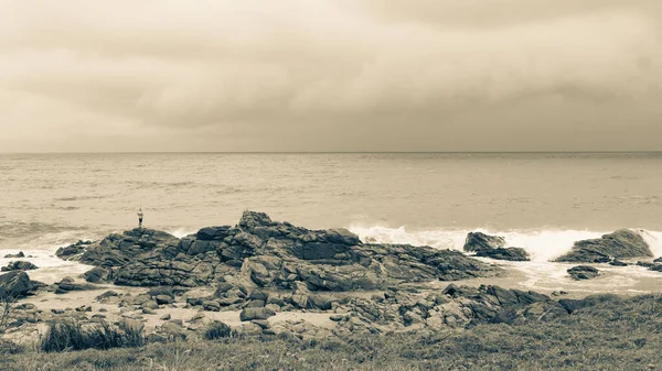 Lifestyle Distant Fisherman Beach Coastline Rocks Fishing Distant Rain Storm — Fotografia de Stock