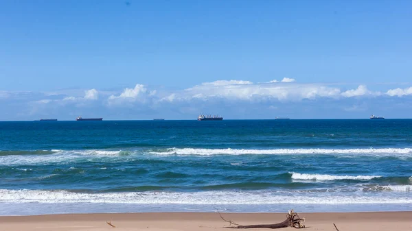 Beach Coastline Marine Ships Anchored Blue Ocean Horizon Awaiting Port — Stock Photo, Image