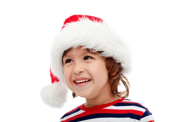 Mały chłopiec z santa kapelusz na głowę — Zdjęcie stockowe