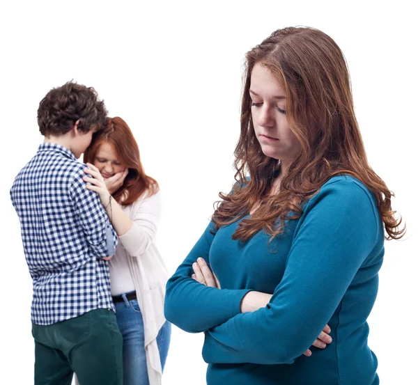 Sad girl and happy couple — Stock Photo, Image