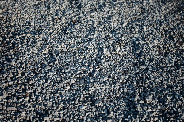 Gładkie Okrągłe Kamyki Tekstury Tła Żwirowa Plaża Morska Zbliżenie Ciemny — Zdjęcie stockowe