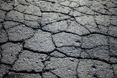 Çatlaklı asfalt yol. Arkaplan dokusu