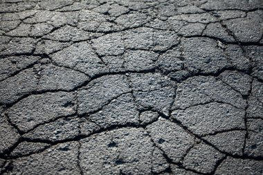 Çatlaklı asfalt yol. Arkaplan dokusu
