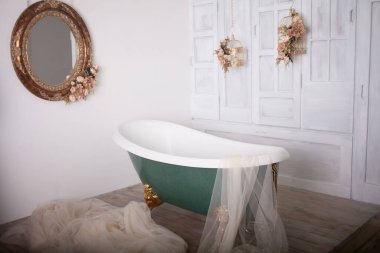 Bath in the center of the studio room
