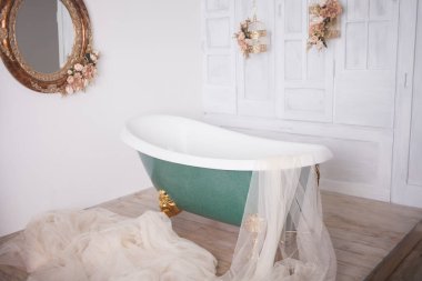 Bath in the center of the studio room