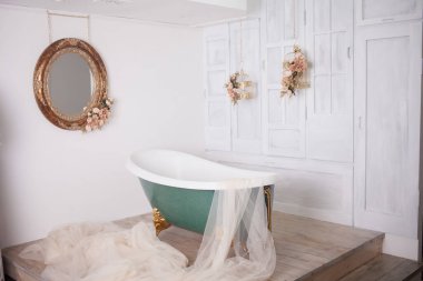 Bath in the center of the studio room