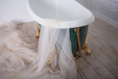 Bath in the center of the studio room