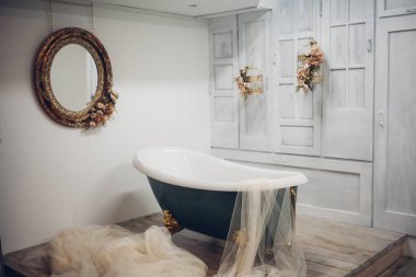 Bath in the center of the studio room
