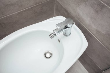 Bidet in modern bathroom interior