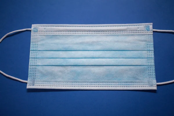 Disposable Face Mask Blue Background — Stock Photo, Image