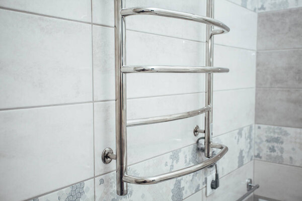 Electric drying on the bathroom wall