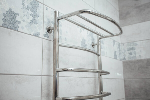 Electric drying on the bathroom wall