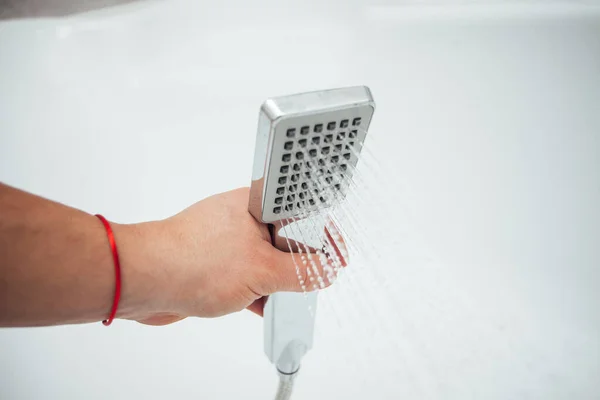 Male Hand Holding Shower White Wall Bathroom Closeup Shot — Stock Photo, Image