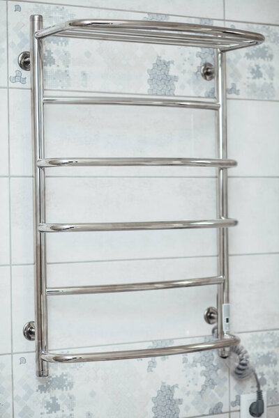 Electric drying on the bathroom wall