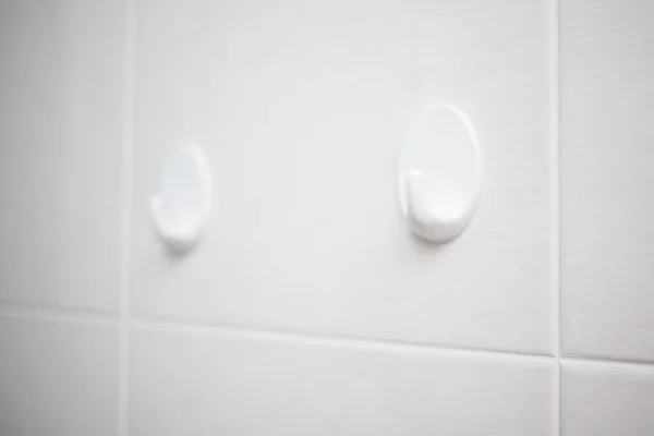 Hangers Bathroom Closeup Shot — стоковое фото