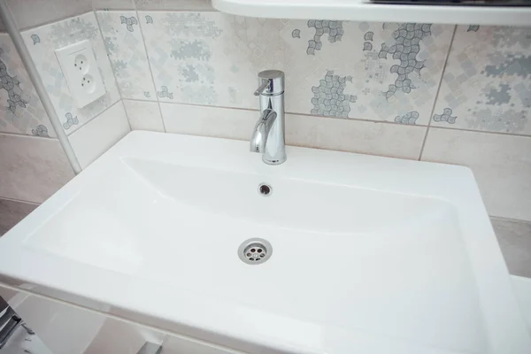 Modern Bathroom Wash Basin Chrome Faucet Gray Tiling Fotos de stock