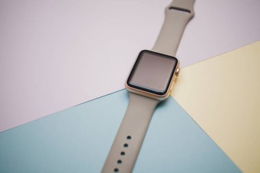Smart watch on a colored background