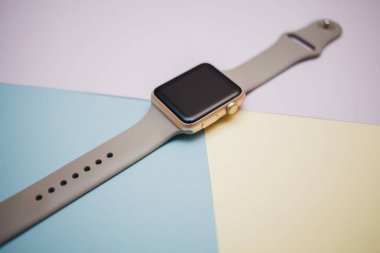 Smart watch on a colored background
