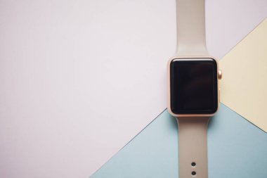 Smart watch on a colored background