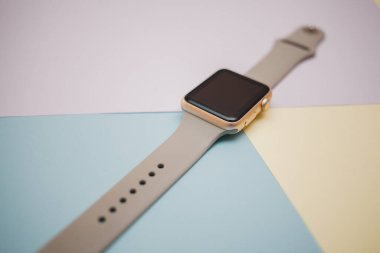 Smart watch on a colored background