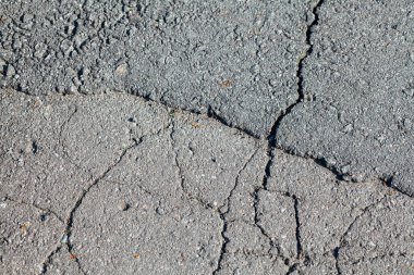 Çatlaklı asfalt yol. Arkaplan dokusu