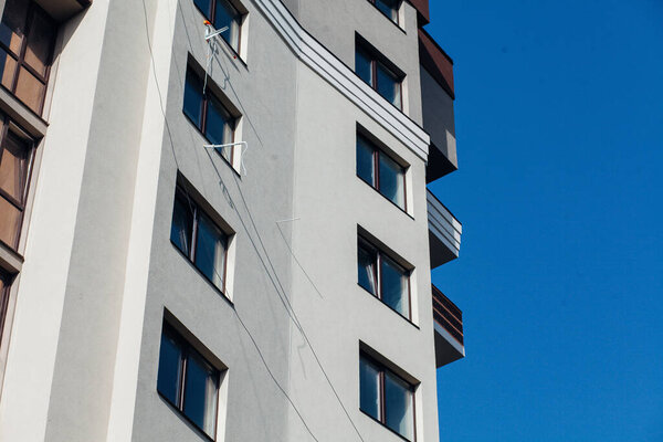 Modern apartment buildings on sunny day. Facade of a modern apartment building