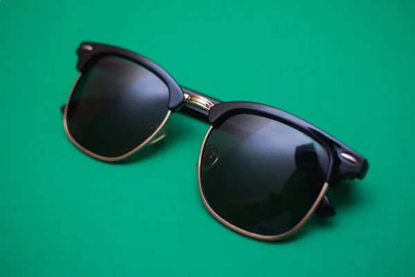Shutter Shades Sunglasses Green Background Closeup — Stock Photo, Image