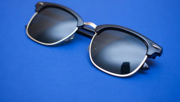 Shutter Shades Sunglasses Blue Background Closeup — Stock Photo, Image