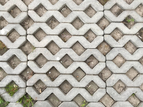 Nested pavers of various colors in chic garden at daytime