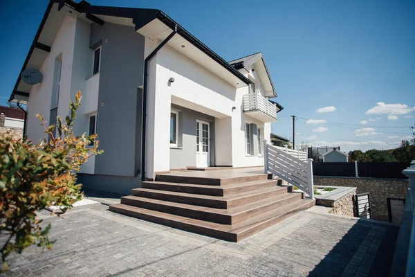 Exterior of modern house on rural street
